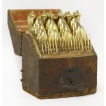 A gilt metal dessert service in a leather knife box,18th century, probably German, the knives with