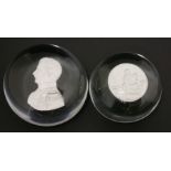 Two sulphide Paperweights,19th century, containing portraits of Prince Albert and Lord Nelson,