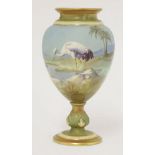 A Royal Worcester Vase,dated 1909, painted with a crane in a desert rock pool, signed 'W Powell',