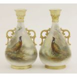 A pair of Royal Worcester Porcelain Vases,dated 1895, each painted with a pheasant, signed 'JAS