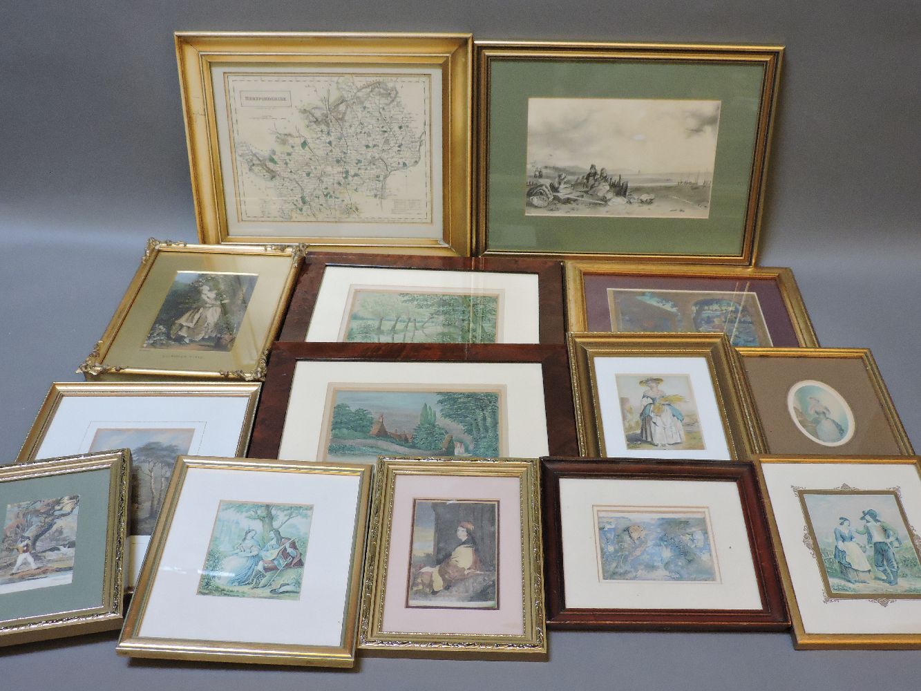 A quantity of decorative pictures and prints, to include examples after Le Blonde, two maps, etc