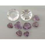 Seven graduated heart shaped faceted amethyst beads, and two round cut rock crystals