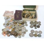 Various coins and banknotes, including an early Spanish coin with two fish and a Roman coin