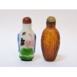 Two Chinese scent bottles and stoppers, one overlaid in four colours with ducks and pond plants, and