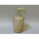 A Roman glass vase, with strap handle, 16.5cm high