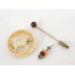 A gold metal red paste stone and blue paste comet brooch, a gold amethyst cabochon stick pin