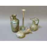 Four Roman glass items, tallest 15cm