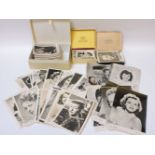 Various boxes of film and TV star postcards and promotional photographs, some signed 'To Irene',