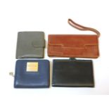 Four assorted wallets, including a grey leather Launer example