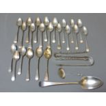 A collection of silver flatware, comprising two pairs of 18th century silver sugar tongs, one