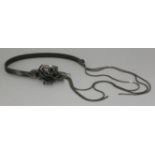 A cased Lanvin naturalistic flower necklace,with a pierced black rose set with black paste, cobra