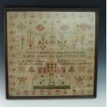 A Regency needlework sampler, by Ann Castle 1816, worked in coloured wool thread on linen