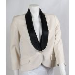 An Alexander McQueen cream wool twill fabric tuxedo jacket,with black silky lapels, flap pockets