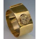 A ladies' cuff-style gold-plated Lanvin mechanical bangle watch, with a circular gold dial and black