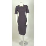 A Matthew Williamson purple wool dress,with large paste stones and beading to neckline, with zip