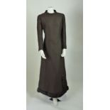 A Rogaire brown evening dress, with mink fur and bead detailing to hemline