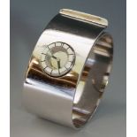 A ladies' cuff-style rhodium-plated Lanvin mechanical bangle watch, with a circular silver dial