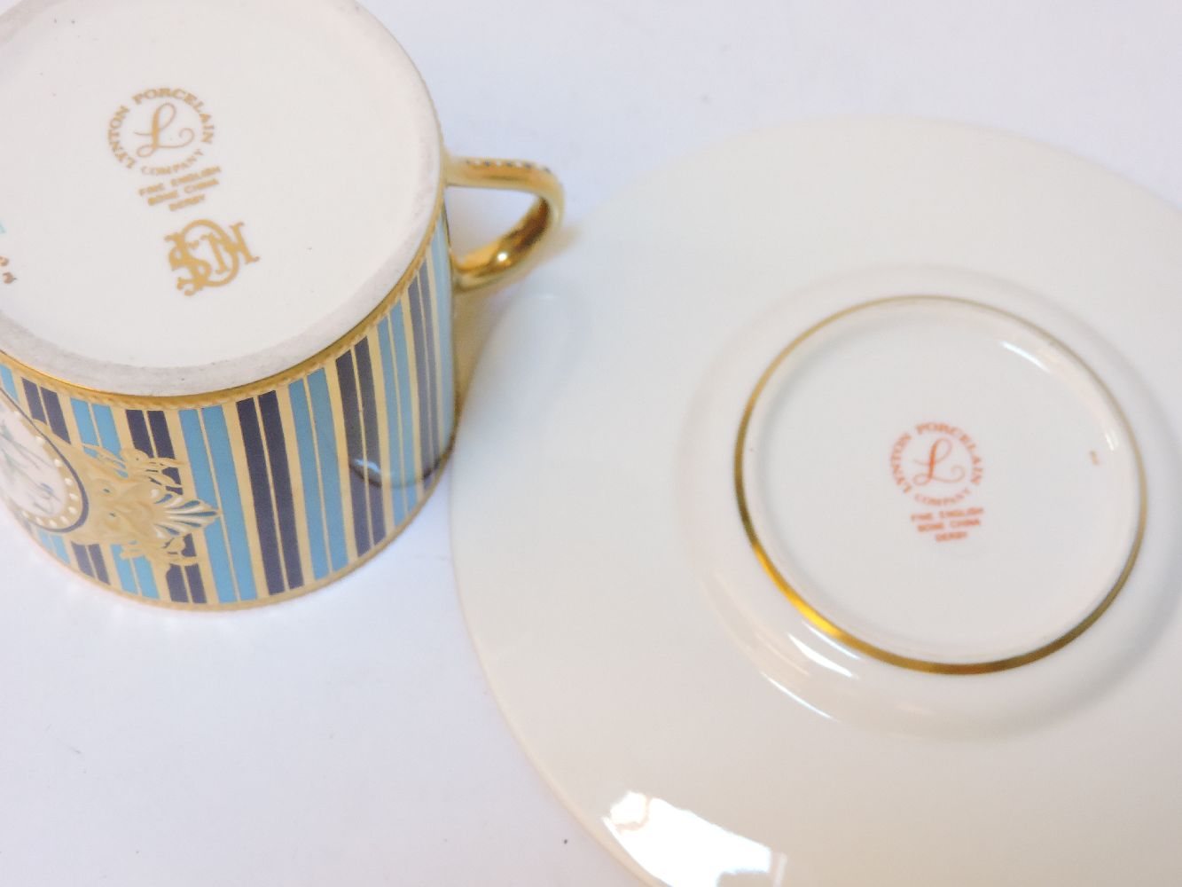 Three Lynton porcelain cups and saucers, each decorated in coloured enamels, with hand painted - Image 2 of 4