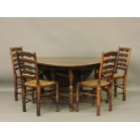 A reproduction George III style oak gateleg table, 130cm wide, 180cm open, and a set of four