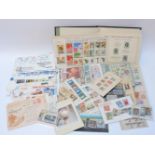 A collection of stamps and first day covers