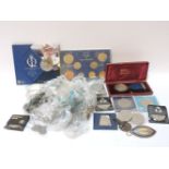 A small quantity of coins, comprising four £5 coins, a 1937 crown, forty-seven pre-1947 sixpences,