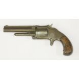 A five shot rim fire revolver, inscribed 'Smith & Wesson, Springfield Mass ...', 19cm long