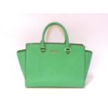 A Michael Kors Selma green tote bag, in Saffiano leather, with gold tone hardware
