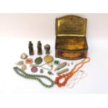 An old tin of jewellery and collector's items, including Chinese soapstone seals