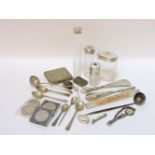 A box of assorted silver and plated items, including an enamel and silver scent bottle, and niello