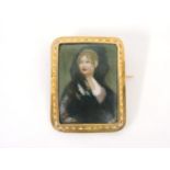 A Continental gold framed porcelain plaque brooch, tested as approximately 18ct gold