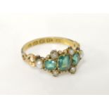 A Victorian 12ct gold emerald doublet and seed pearl ring, Birmingham 1864, size M½