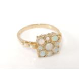 A 9ct gold opal square cluster ring, 2.7g