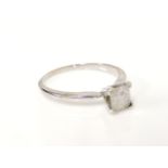 A white gold single stone diamond ring, approximately 0.50ct, possibly fracture filled, marked