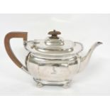 A silver teapot, Sheffield 1934, crested, 23oz