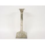 A George III silver Corinthian column candlestick, London 1764, 32cm high, drilled