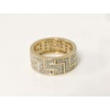 A gold diamond Greek key set band ring, marked 375, total diamond weight stated as 1.00ct, 4.8g