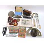 A quantity of miscellaneous items, to include a cased instrument, pipes, pens, etc