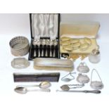 A small quantity of silver items, wine bottle coaster, decanter labels, silver backed brushes, a