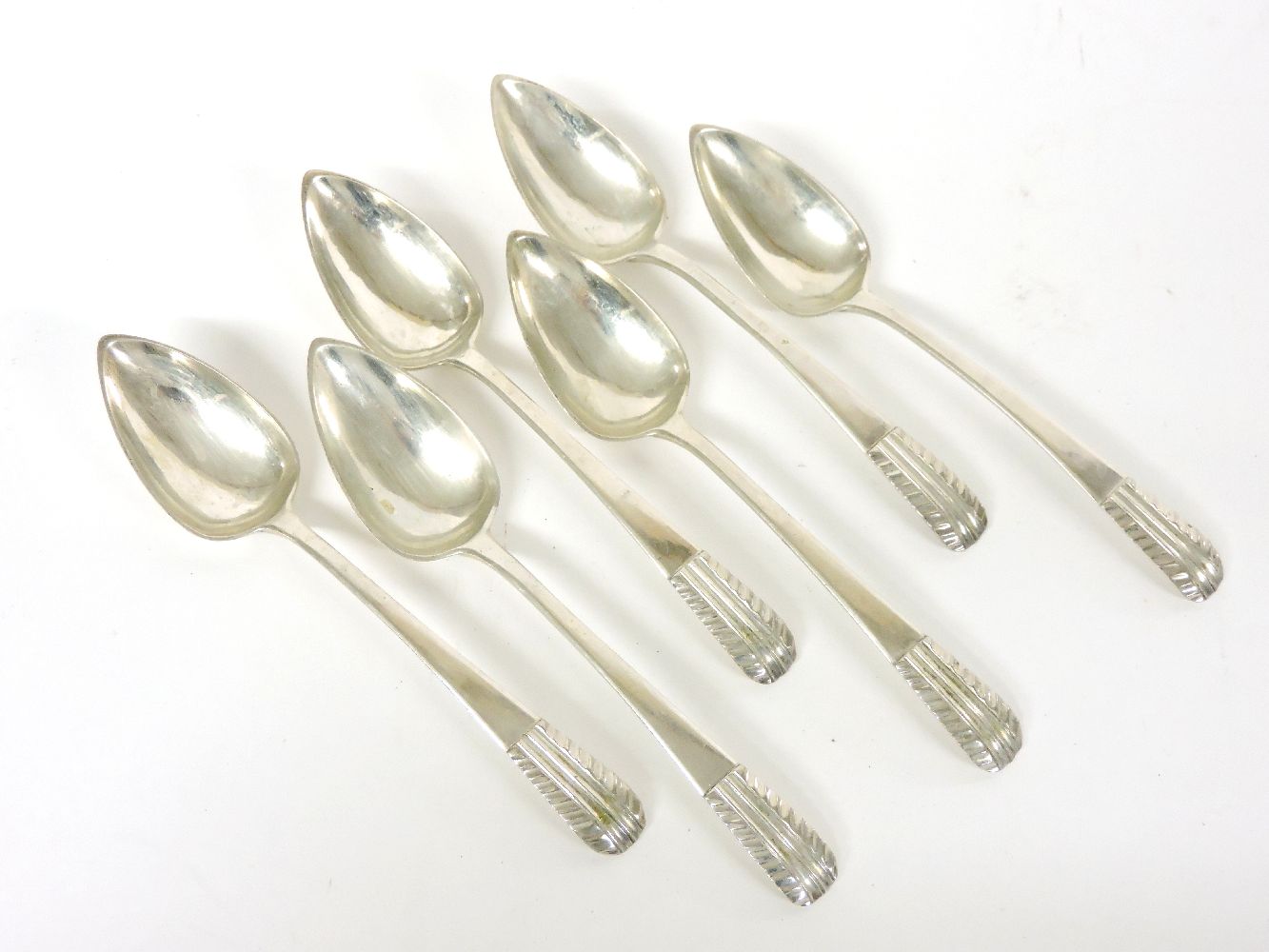 A set of six Portuguese silver spoons, with pointed bowls, 8oz