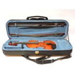 A modern violin, and two bows, cased