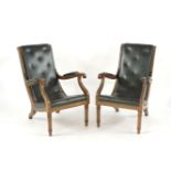 A pair of Regency style teak library chairs, with buttoned leather upholstery, 95cm high