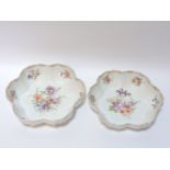 Two Continental porcelain bowls, decorated with flowers, 21cm diameter