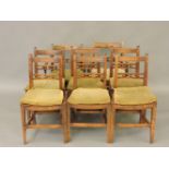 A set of eight East Anglian elm and ash chairs, comprising a set of six singles and a pair of