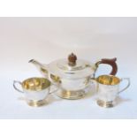 A 20th century silver three piece teaset, by Mappin & Webb, marks for Sheffield, approximately