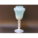 A Venetian coloured glass vase, blue moulded bowl on vaseline stem and foot, 33cm high