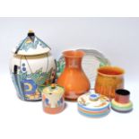A Phoenix ware 'Syrian' vase and cover, a Clarice Cliff Spring Crocus preserve pot and cover, a