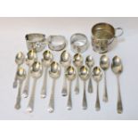 A quantity of fourteen Georgian and later silver teaspoons, various patterns, three silver napkin