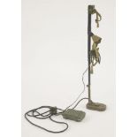 A mid 20th century land mine detector, the telescopic shaft in five sections, the battery pack