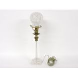 An Edwardian table lamp, with cut glass and gilt bronze Corinthian column and globe shade, 45cm