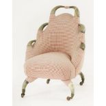 A Victorian 'horn' child's novelty armchair, upholstered with gingham fabric and raised on castors